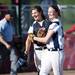 Saline pitcher Kristina Zalewski and catcher Katie Alexander smile and embrace after defeating Monroe 2-0 in eight innings on Monday, June 3. Daniel Brenner I AnnArbor.com